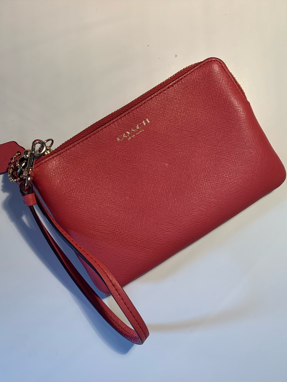 Coach | Coral Leather Wristlet with Gold Logo